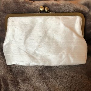Pearl and gold clutch with paisley inside detail
